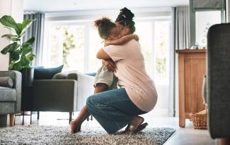 Mother and child embracing
